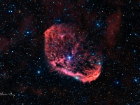 20160806 NGC6888 LRHaGB 9x600s  This is my interpreation of NGC 6888 the Crescent Nebula.  This image is composed of 12-10 minute images through Red, Green, Blue, Luminance and Ha filters for a total exposure of 10 hours.  The Crescent Nebula is an emission nebula powered by a Wolf-Rayet star in the constellation of Cygnus (The Swan). The star is dying very quickly and it has shed a lot of it's star matter and continues to do so at a very high rate. NGC 6888 is around 5000 light-years distant and is rather dim. It can be seen with a modest telescope, an OIII or UHC filter helps tremendously. Date:7/17/16 Location: Hutville, OH Mount: Paramount ME Camera: Apogee CG16M Optics: Planewave CDK-17 Exposure: L=R=G=B=Ha = 12x600 secs each Processing: PixInsight